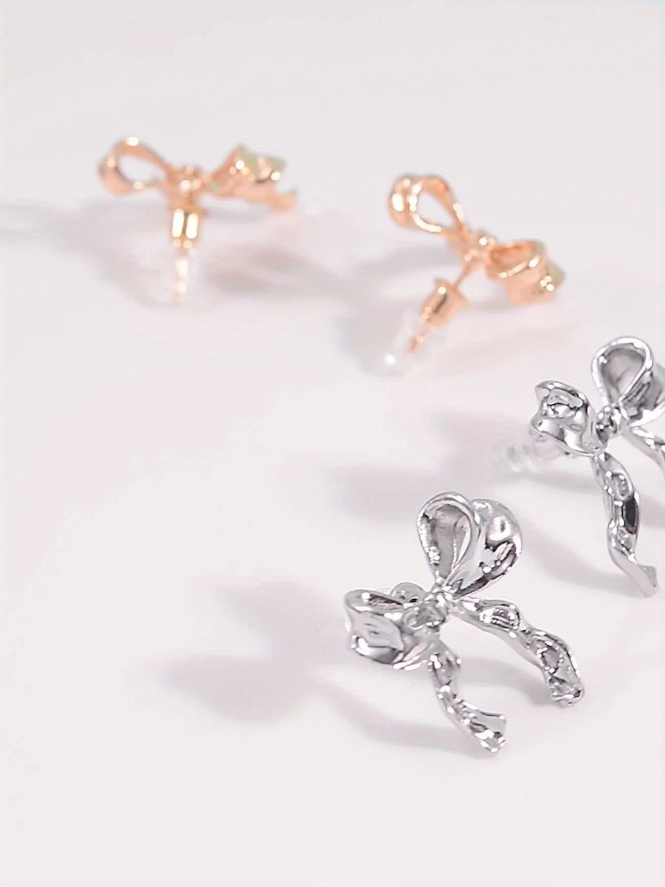 Bronze Asymmetrical Butterfly Bow Earrings