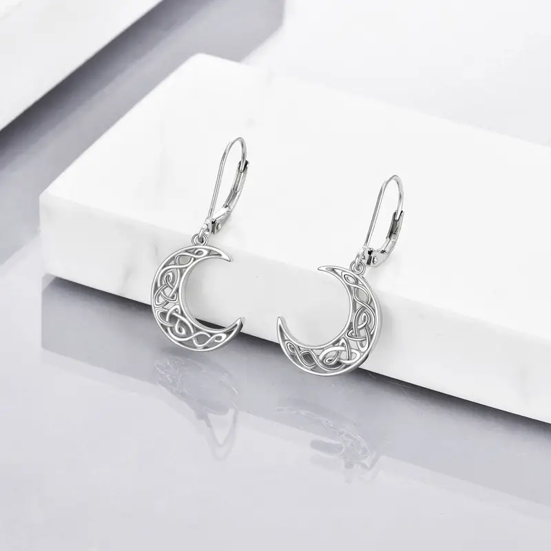 womens celtic style moon earrings 925 sterling silvery crescent pendant jewelry with intricate star patterns casual attire or gifting moon jewelry Product details 0