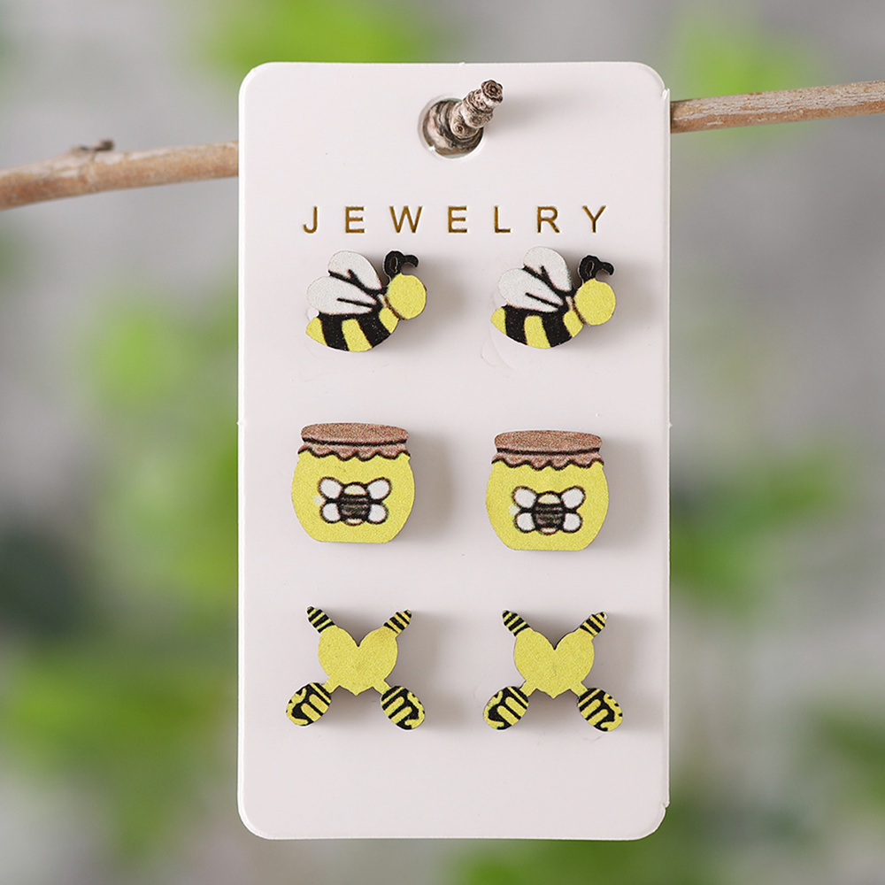 Gold cake 2025 bee earrings