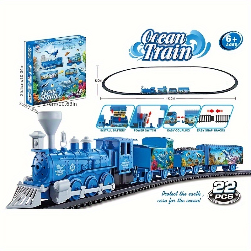 TEMI Juego de tren a pilas con locomotora de vapor, coche de carga y pista  para niños de 3 a 7 años, con luces, sonidos y humo