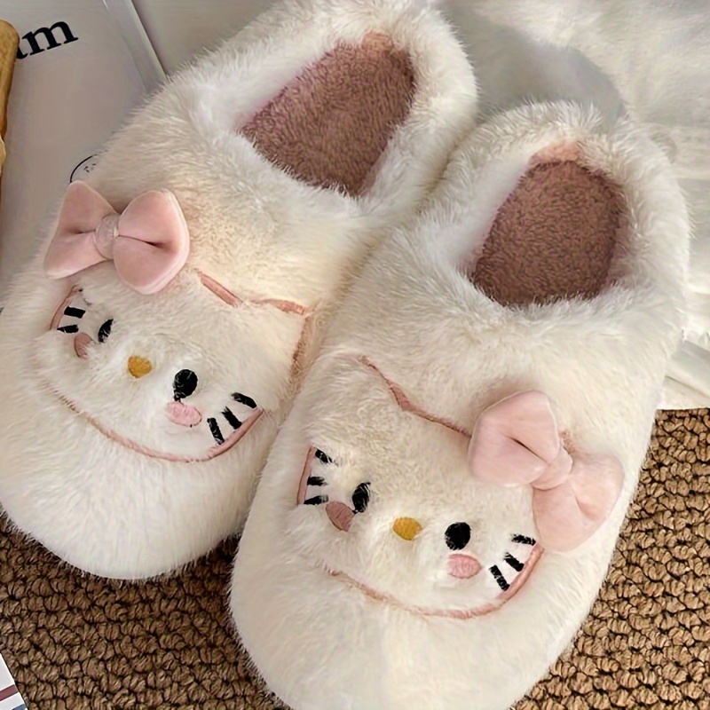 Hello kitty deals slippers adults