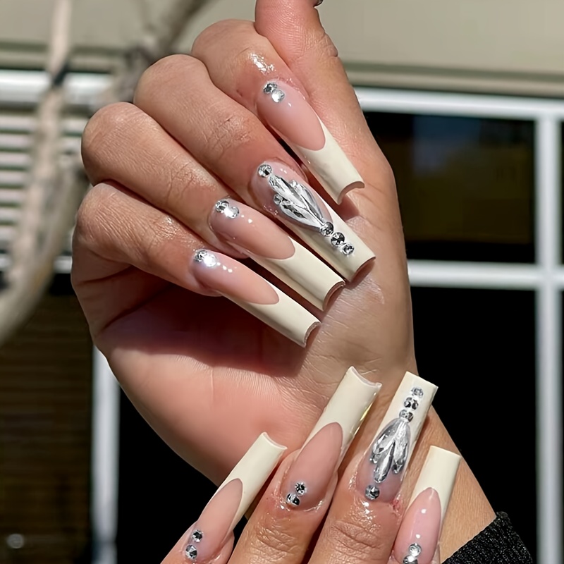 white acrylic nails with rhinestones  White acrylic nails, Long square  acrylic nails, Long acrylic nails coffin