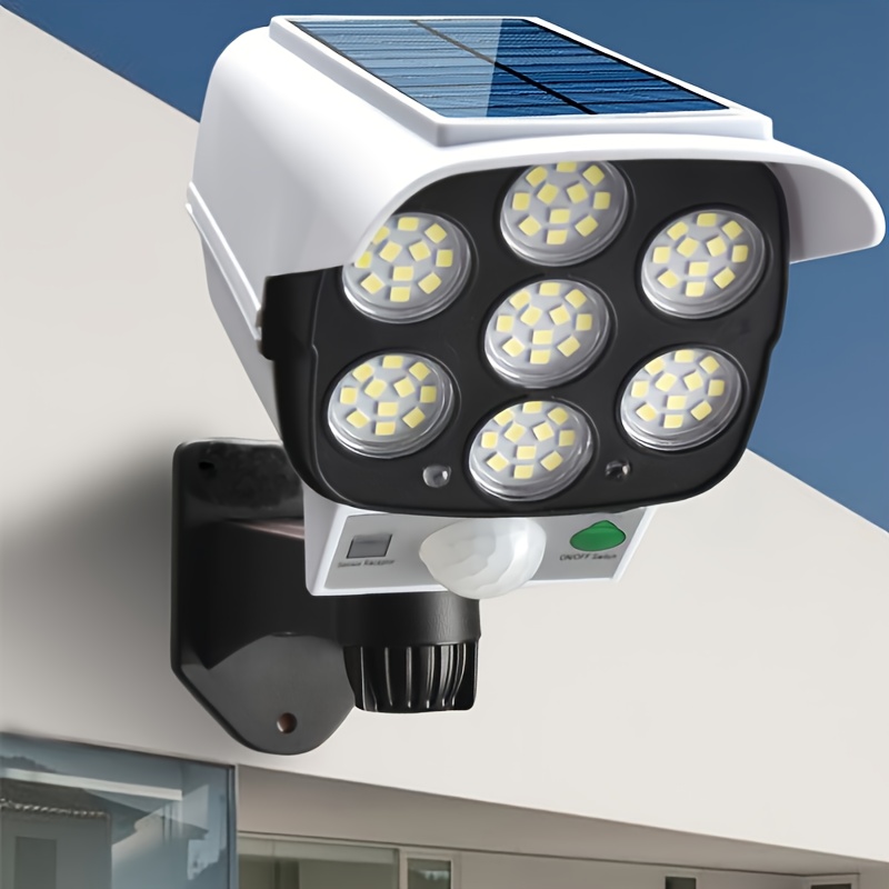 Cámara falsa con luz, cámara CCTV de vigilancia de seguridad simulada  giratoria de 360°, luz solar súper brillante impermeable con sensor de