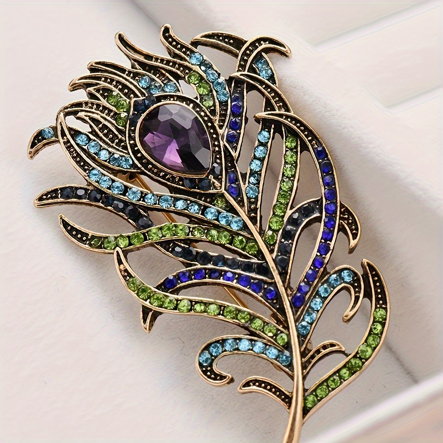 

Elegant And Stylish Artificial Crystal And Feather Brooch For Women's Suits And Dresses With A Retro And Graceful Personality.