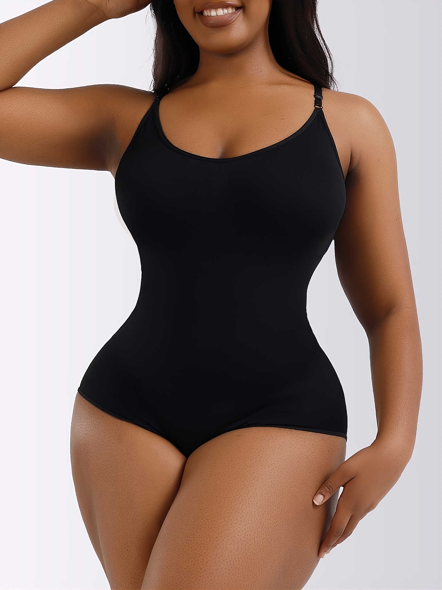 Cami Shaper is easy to wear - one piece curve hugging seamless design.  Magic pouch accommodates removable modesty pads for extra lift and