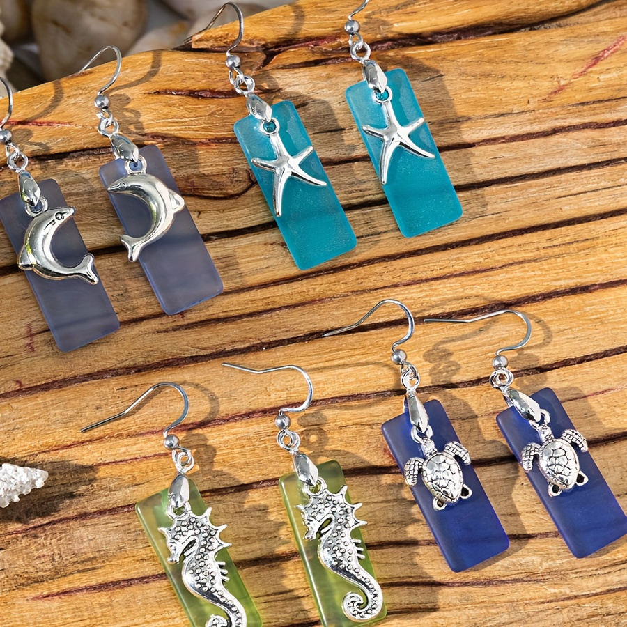 

Bohemian Style Beach Glass Earrings Set, Starfish, Turtle, Seahorse, Dolphin Charms, Vacation Themed Ocean Jewelry