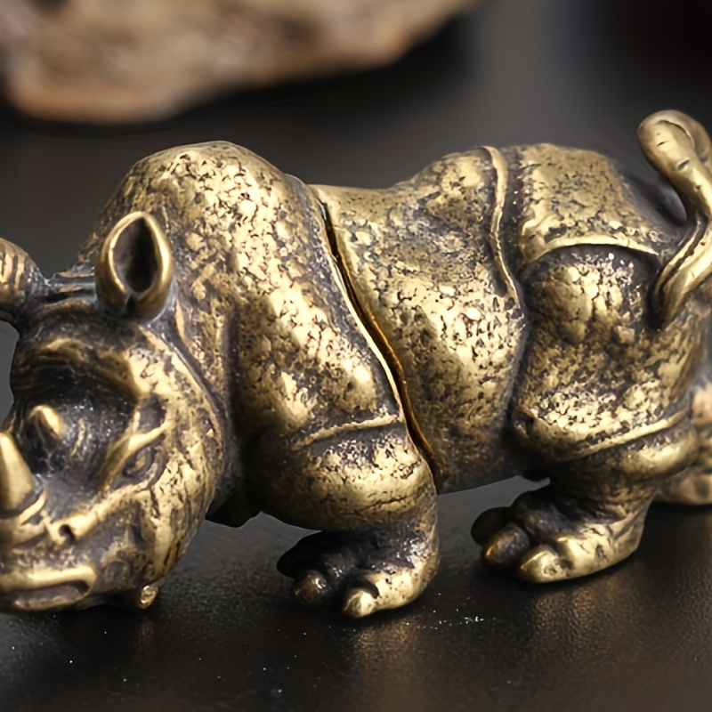 

1pc, Exquisite Brass Rhinoceros Statue - Hand Carved Ornament, Excellent Technique, Mini Copper Statue, Suitable For Indoor Decoration, Showing Unique Taste And