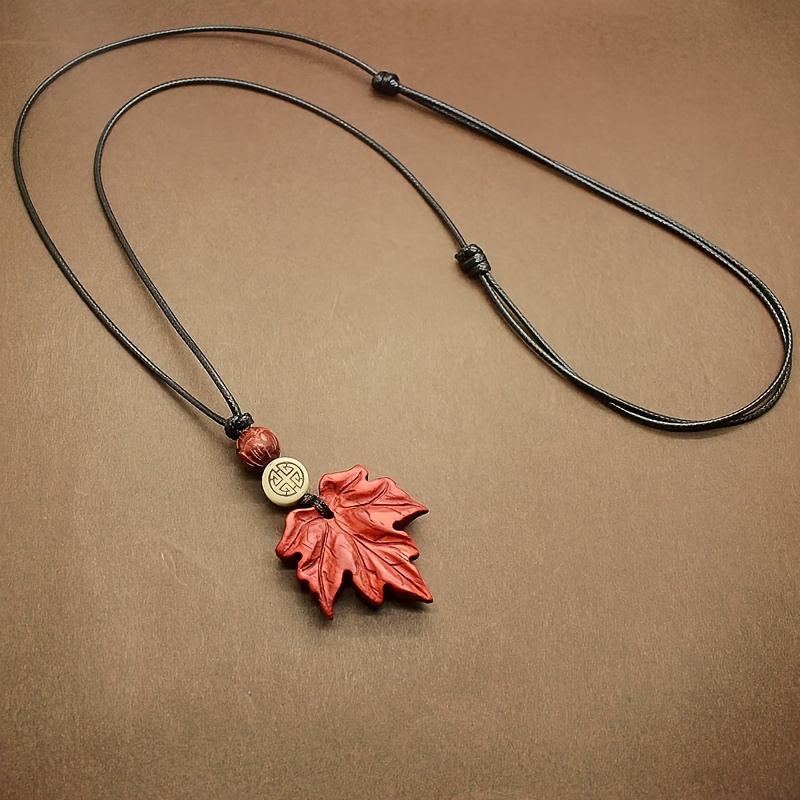 

Collier Pendentif Feuille d'Érable en Bois de d'Inspiration Vintage - Chaîne Longue Polyvalente pour Pull pour Femme, pour Tenue Décontractée & Thanksgiving