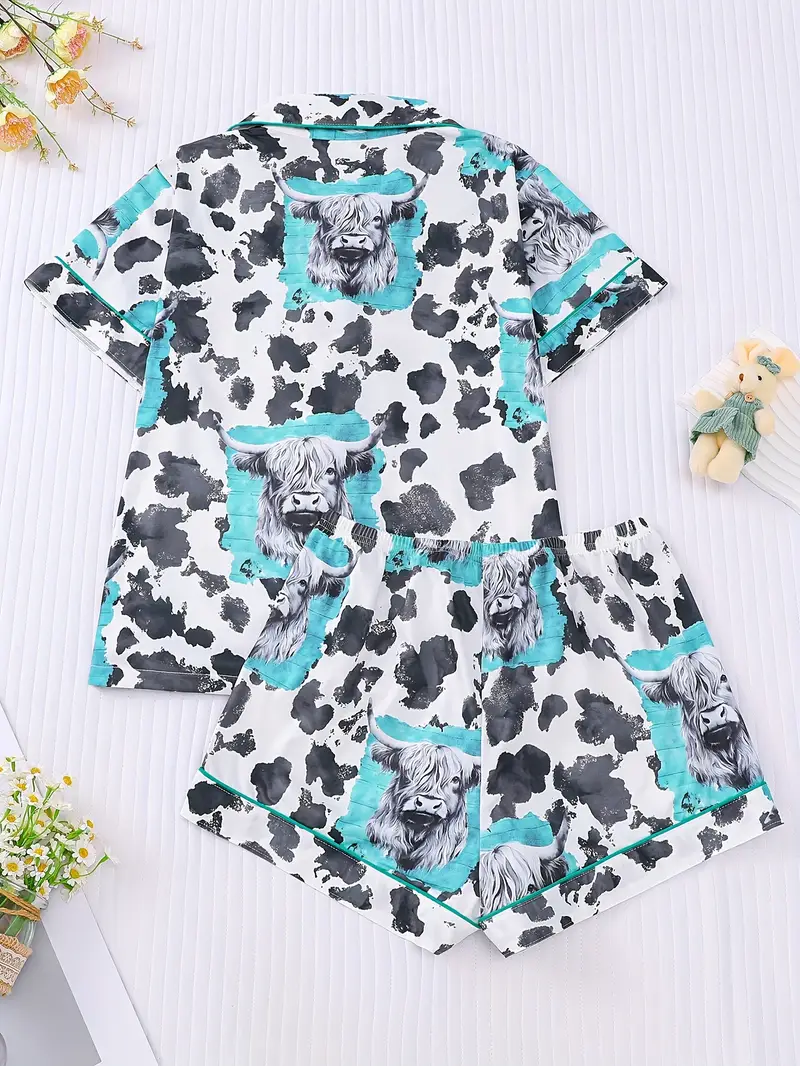 two piece womens white pajama set cow print fabric comfortable for short sleeved button top collar and matching shorts with full body print and pocket details suitable for adult pajama set Product details 1