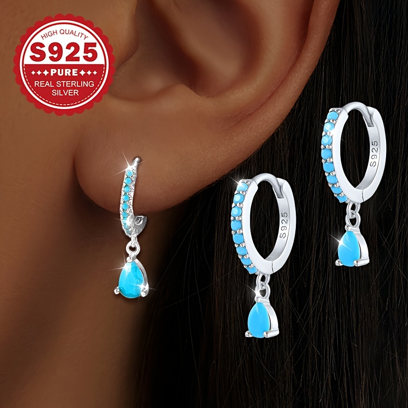 Image of A Pair Of Fashionable Women's Stud Earrings, Made Of S925 Sterling Silver With Water Drop Pendants, Inlaid With Synthetic Turquoise. This Classic And Stylish Unique And Exudes Luxury