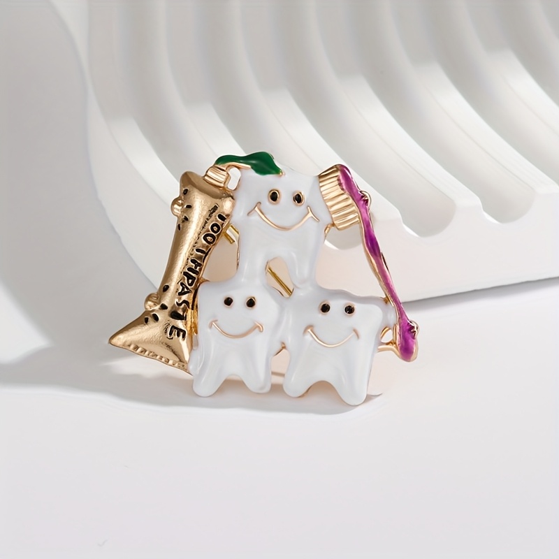 TEMU Broche d'ongle en émail avec brosse à dents et dentifrice - Pin à revers sur le thème dentaire argenté/doré pour femmes, vêtements, manteaux,