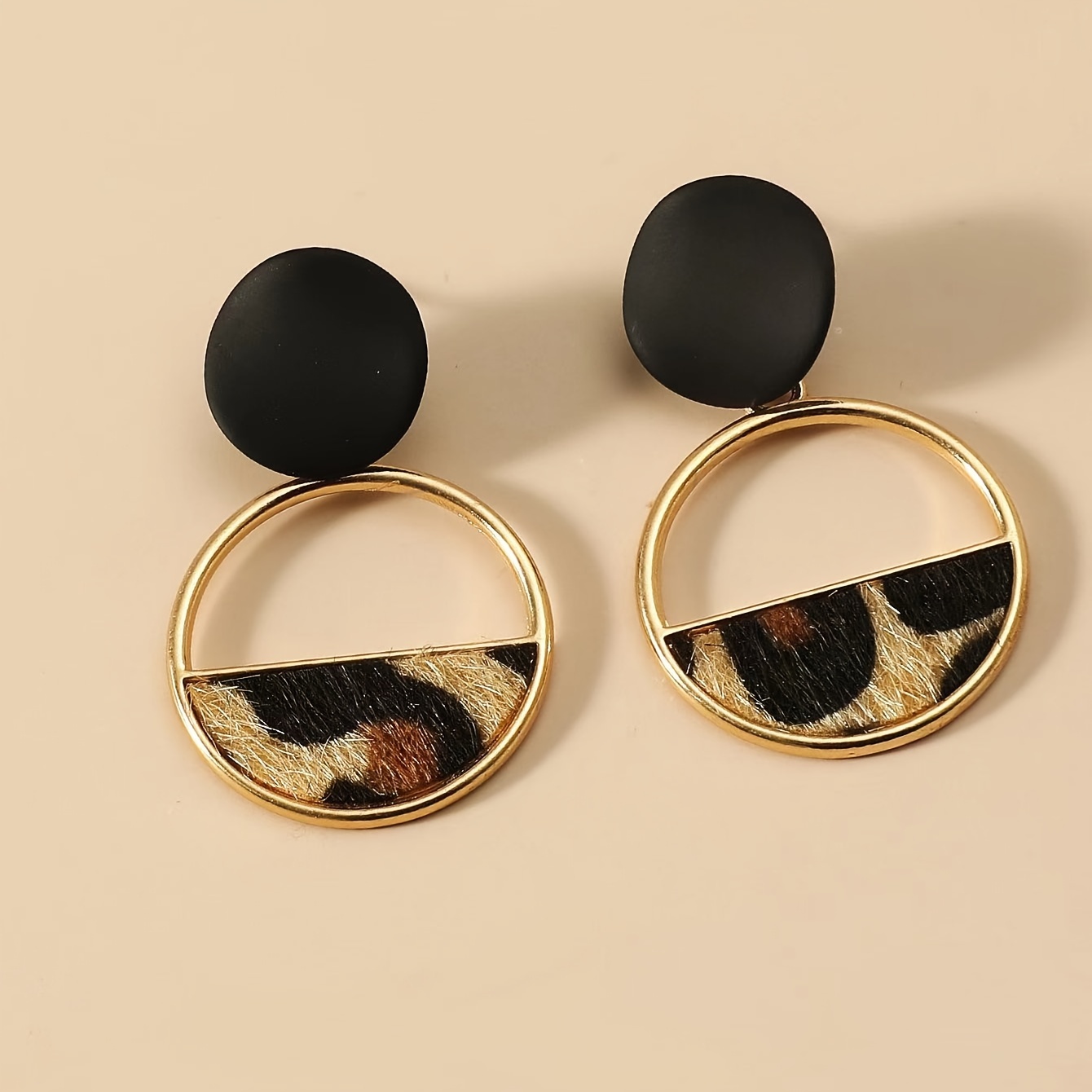 A Pair Of Stylish Drop Earrings For Women, Featuring Chic Round Leopard Print Designs, Wear