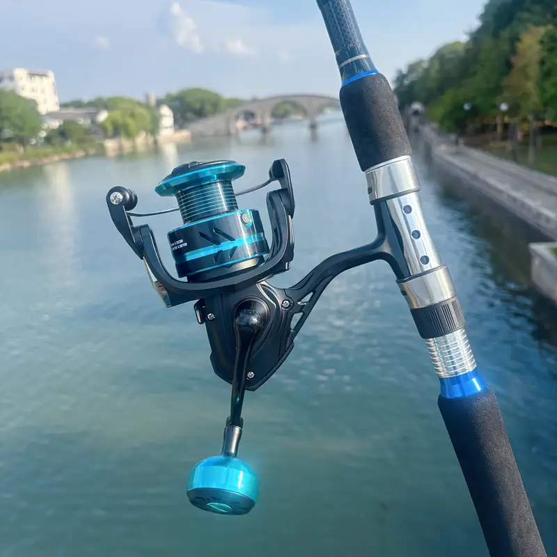blue green fishing spinning reel Profishiency 6'6" Mint Combo Tie on a Saltwater Poppin Cork and attach the monofilament leader with flats jighead The teal spinning sparkle elite