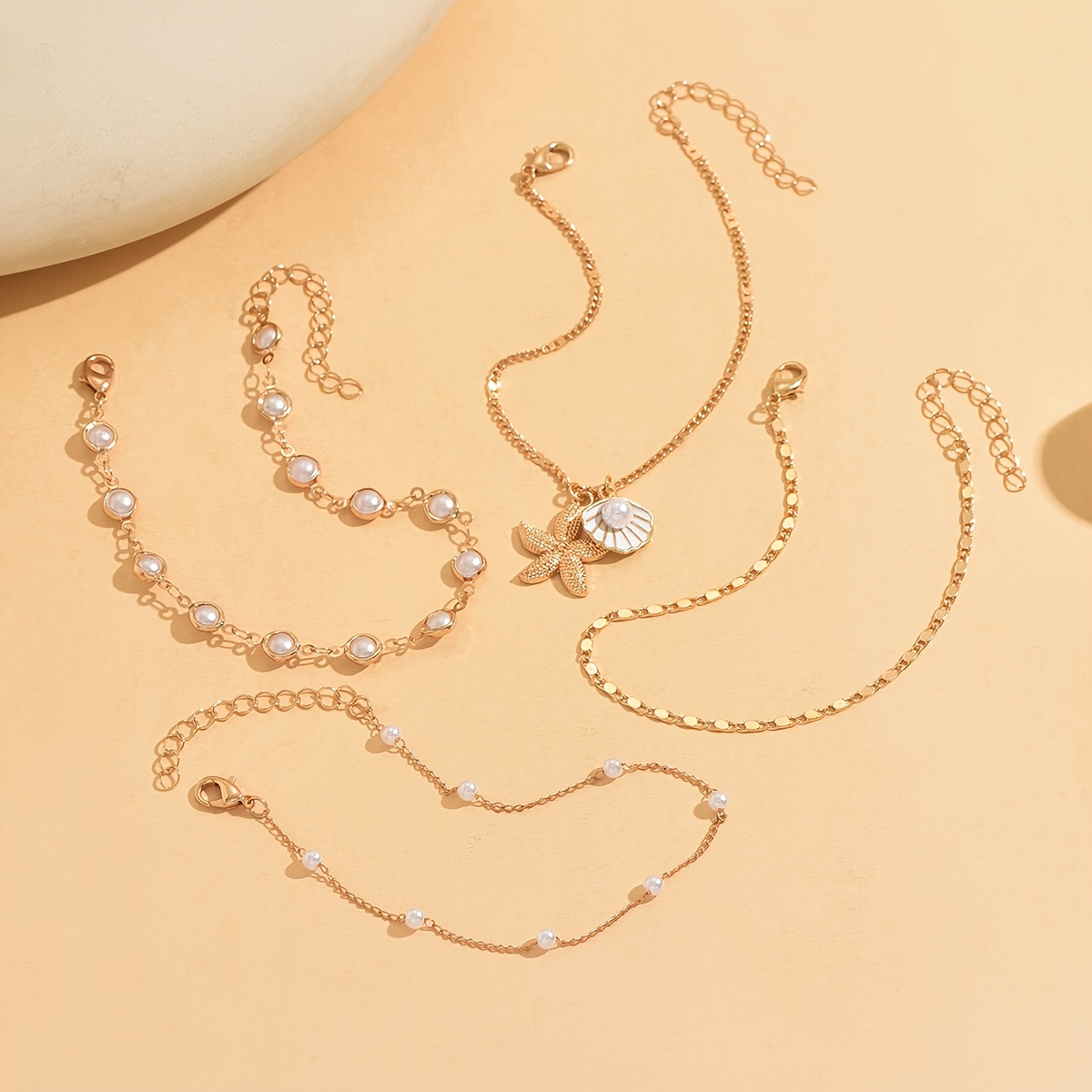 TEMU 4pcs Versatile & Plain Golden Anklet Settrendy Layered Women Foot Jewelry Decorated With Golden Starfish And Shell Pendants, Perfect For Daily