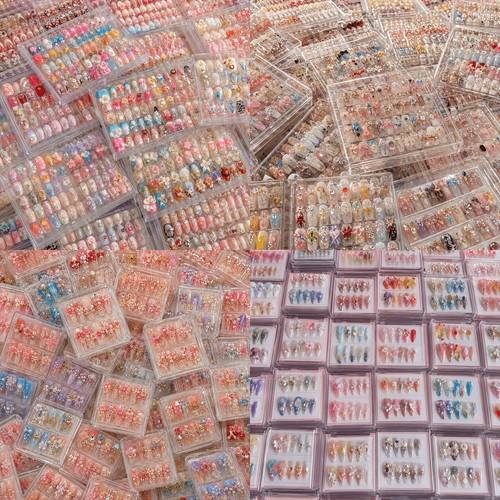 192pcs of assorted nail designs in medium short and long lengths featuring square almond oval and ballet shapes stylish and shiny nail products are removable false nails that enhance your look and showcase the beauty of your nai