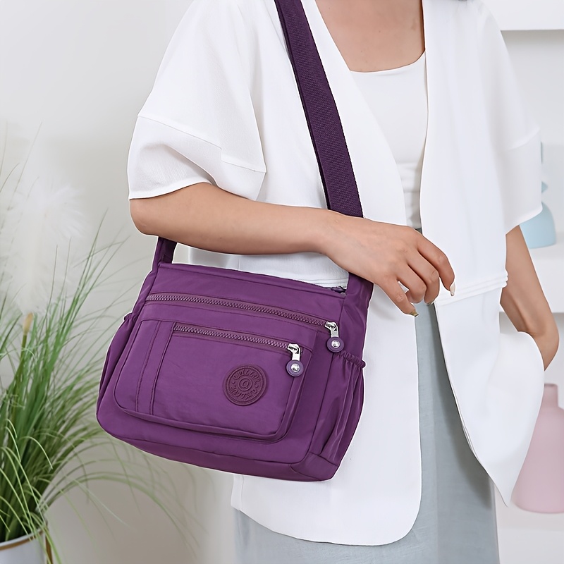 large capacity oxford fabric multi pocket drawstring crossbody bag simple womens shoulder backpack details 1