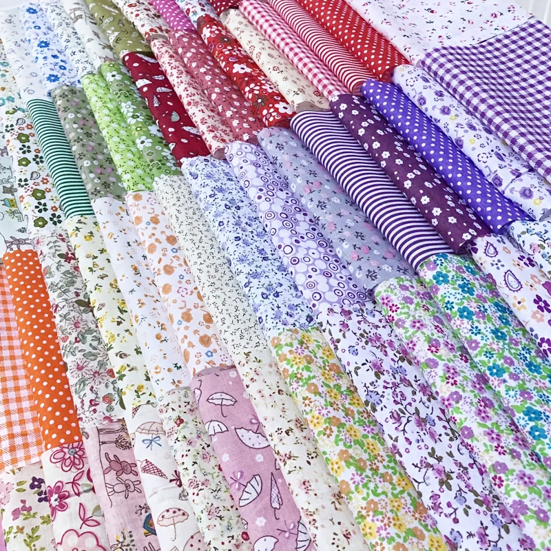   pieces of cotton floral fabric waste are used as   diy   materials for making doll clothes