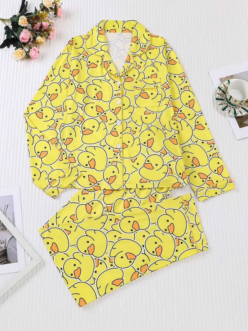 two piece womens yellow duck print pajamas set fabric comfortable all year round long sleeved button up top collar and matching pants with full body print and pocket details suitable for adult pajamas set Product details 0