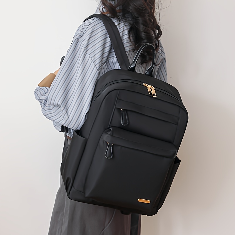 large capacity womens backpack lightweight multi functional solid color with adjustable straps nylon travel school bag in black khaki cream durable zip closure travel backpack 5