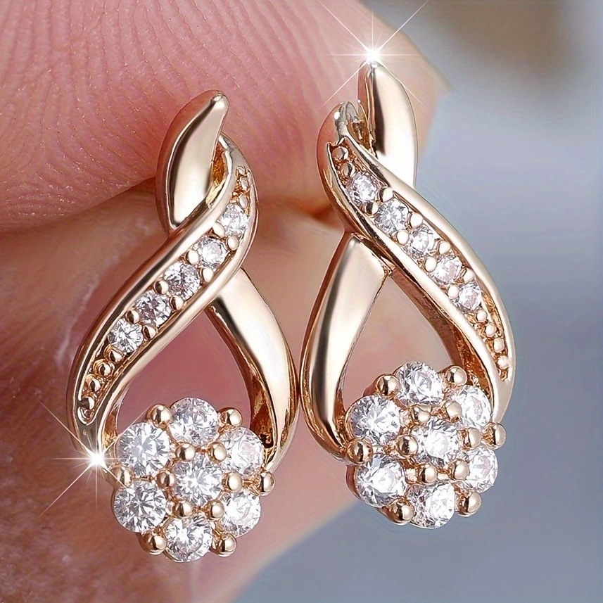 Image of A Pair Of Adorable White Round Stone Snowflake Earrings For Women, Featuring Zirconia Wedding Jewelry