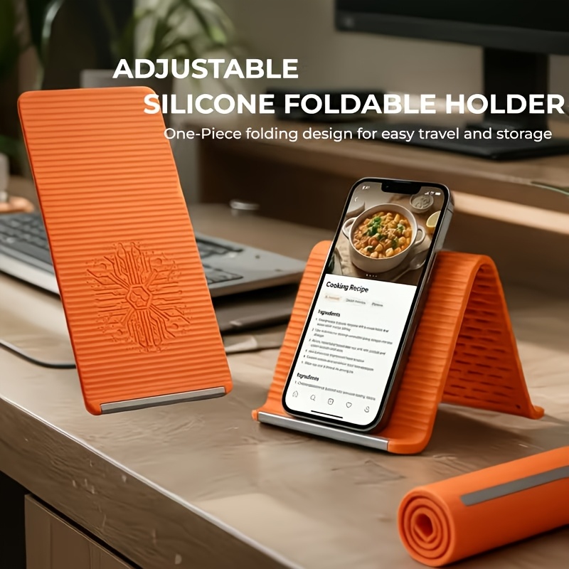a newly designed foldable stand that   shaped featuring an inner aluminum sheet and silicone material for flexible support and bending it serves multiple purposes perfectly compatible with phones tablets and laptops Product details 0