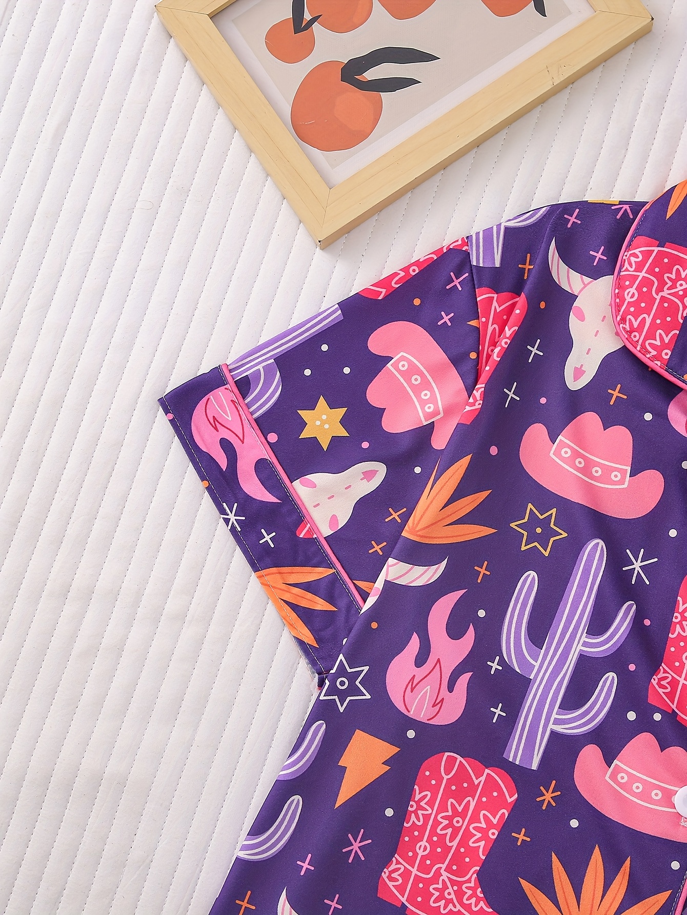 two sets of womens sleepwear sets   of womens sleepwear sets fabric short sleeved button up top and matching shorts full body print collar and pocket details suitable for womens adult sleepwear sets Product details 5