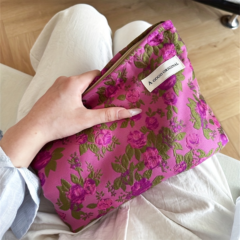 E-shop Eine große, frische und lebendige Blumen-Make-up-Tasche, zum Organisieren von , ein unverzichtbares Reiseaccessoire, ideal als Geschenk für