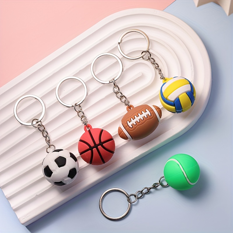 

5pcs/set Sports-themed Pendant Keychains For Fans Of Football, Basketball, Volleyball, Rugby And Car Racing