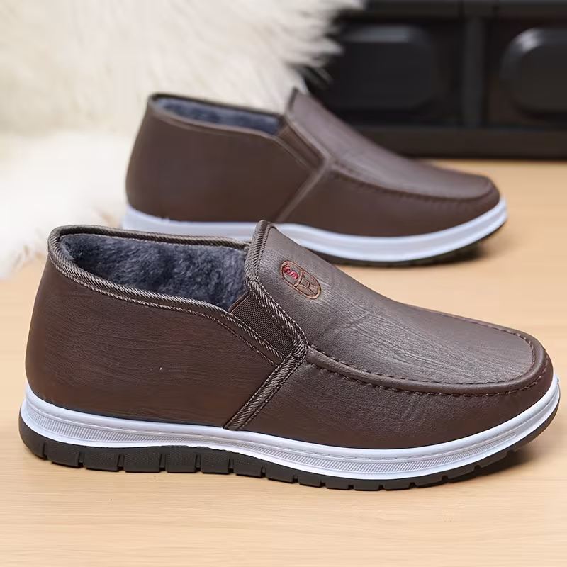 mens winter boots slip on ankle boots with a flat design black insulated footwear featuring thickened warm lining low heeled round toe non slip solid color minimalist style outdoor pvc sole hiking shoes Product details 10