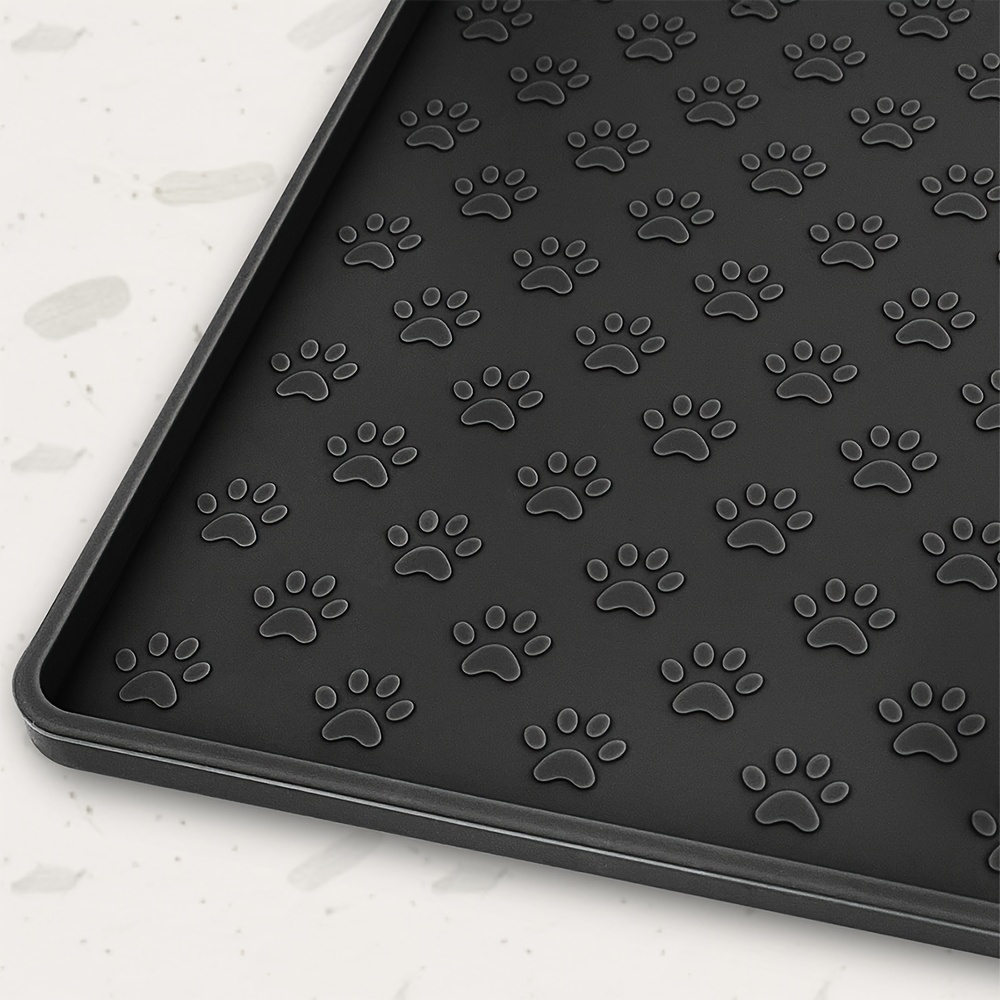 

Non-slip Silicone Pet Mat, 18x12 Inches, Durable Waterproof Tray With Raised Edges, Easy Clean, Multipurpose For Dog & Cat Bowls, Black With Paw Print Design