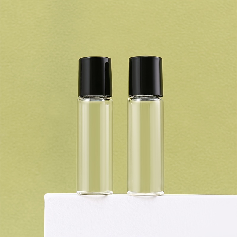 

2 flacons à bille d'huile essentielle de 5 ml, flacons à bille en verre transparent avec billes à bille rose et bouchons noirs pour , le parfum et l'huile essentielle, de voyage