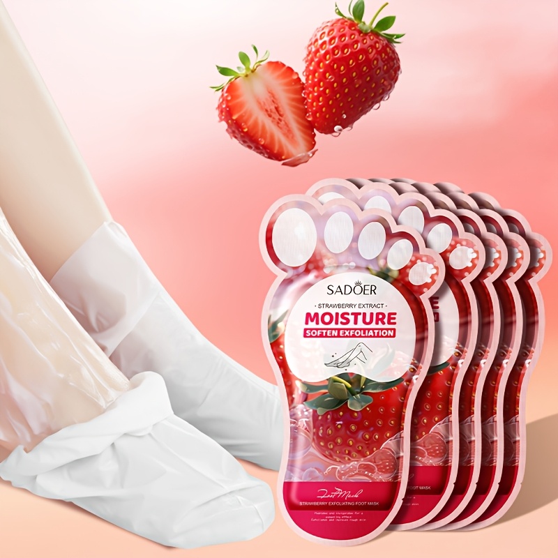 a pair of strawberry   designed for exfoliation   niacinamide and hyaluronic acid   provide deep nourishment and hydration to the skin leaving feet feeling smooth soft delicate and shiny