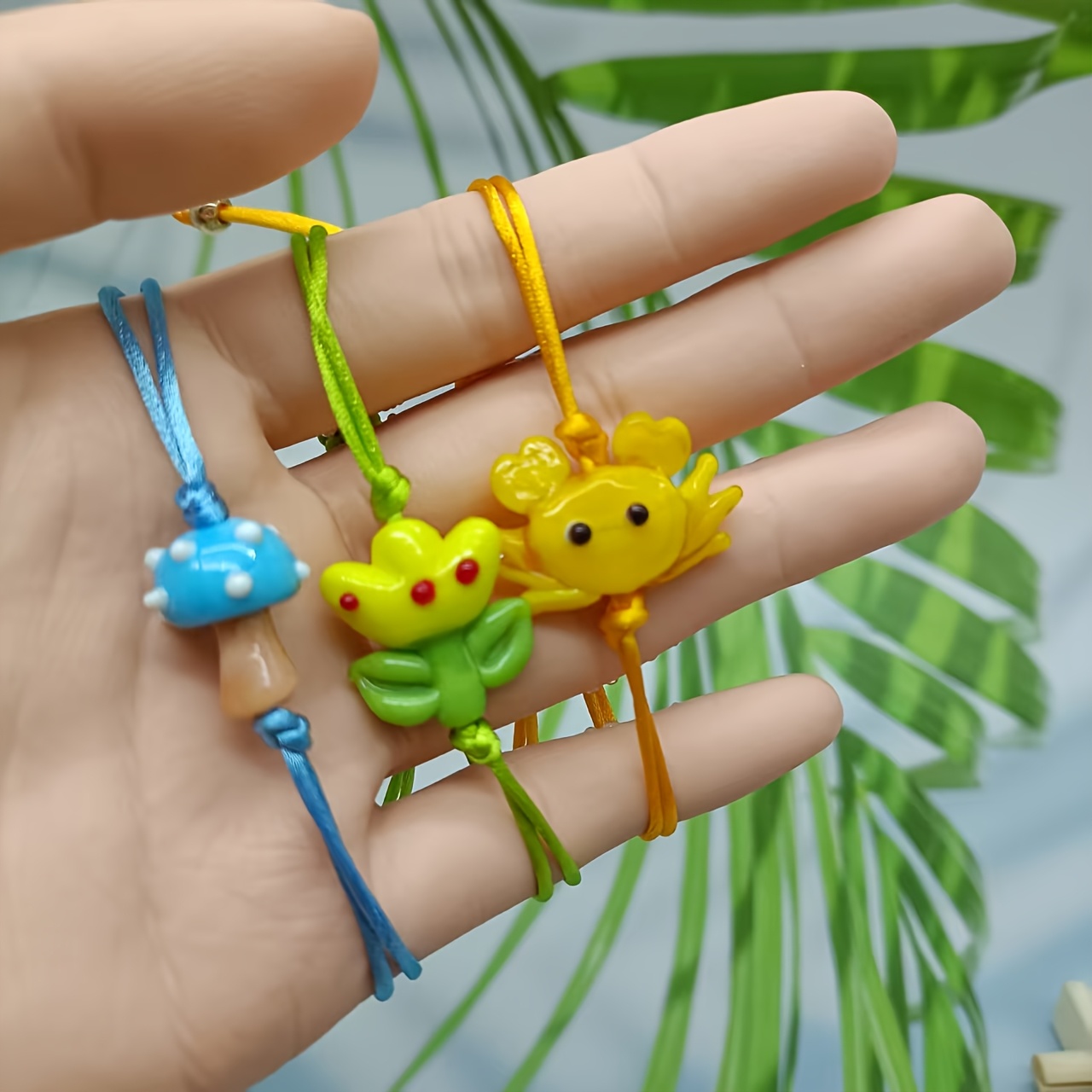 Glass Bead Bracelet with Yellow Flower Charm & Green Beads