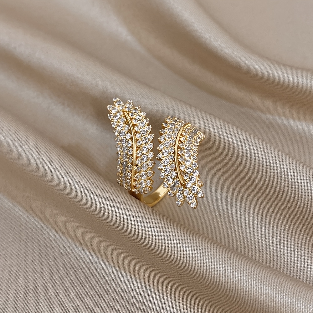 TEMU 1 pièce Bague pour femme en cuivre plaqué avec feuille, Bague en synthétique, Bracelet ouvert réglable, Bijou de style luxe, Bijou en métal et