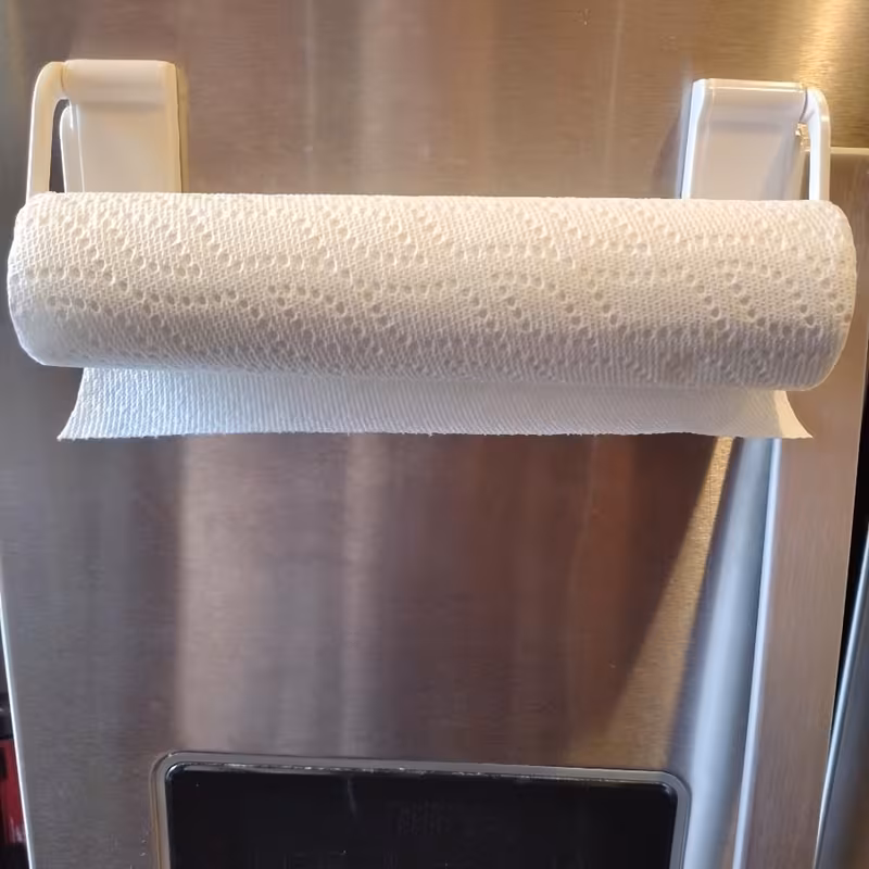 1 space saving adjustable kitchen magnetic paper towel holder wall mounted no drilling required strong magnet fits 99 of paper towel rolls refrigerators and microwaves fridge organizer minimalist storage strong magnetic Product details 1