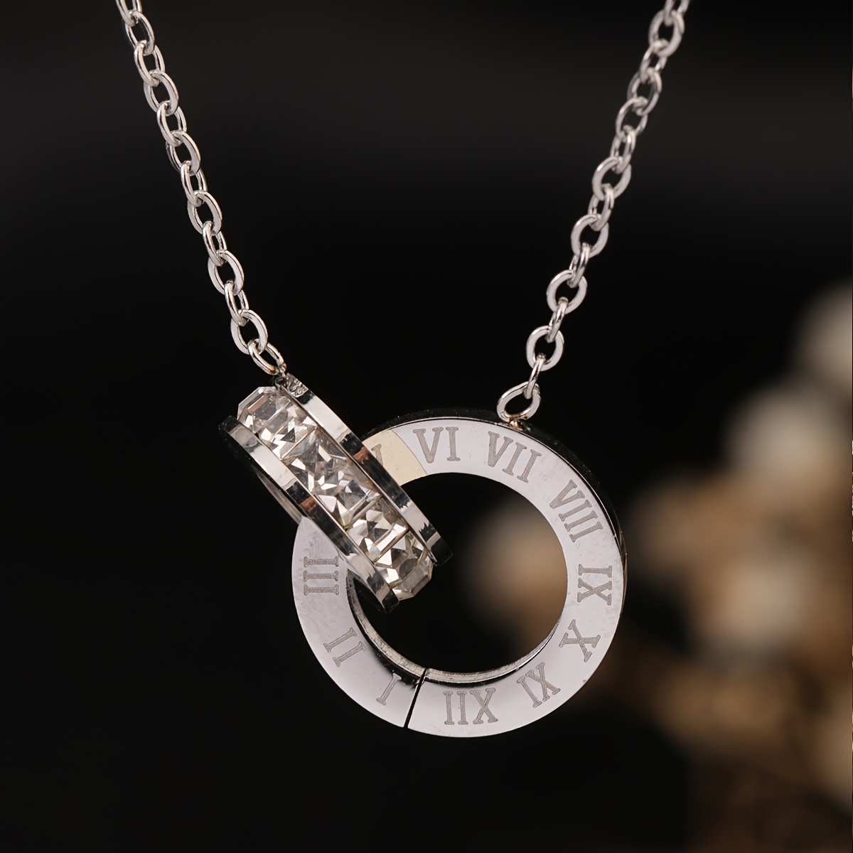 a stainless steel 18k golden plated roman     pendant with rhinestones and artificial crystals featuring a simple and     elegant and suitable for womens daily wear or parties perfect as a birthday gift or for Product details 6