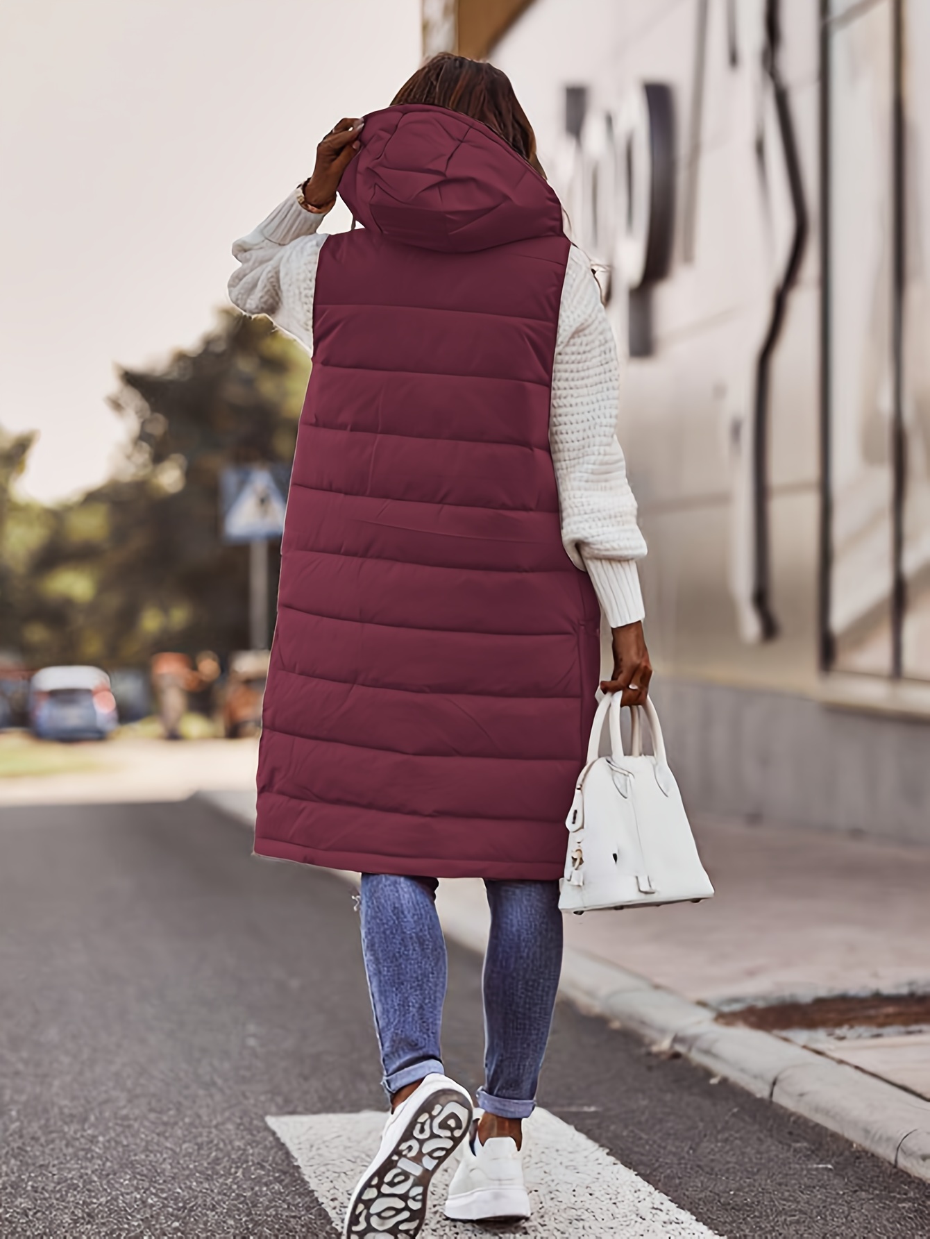 womens long hooded vest casual sleeveless polyester quilted jacket with front zip closure and pockets solid color black warm non stretch fabric ideal for fall winter layering details 6