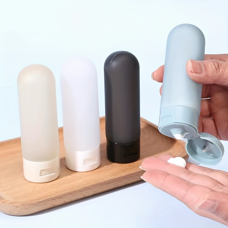 TEMU Set Of 4 Portable 60ml/2oz Squeeze Bottles, Ideal For Travel. Perfect For Storing Facial Cleansers, Shampoos, Shower Gels, Sunscreens, And More