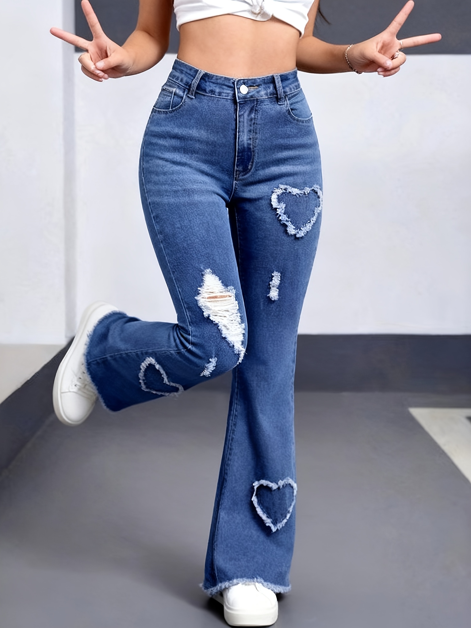 high waist vintage heart   ripped denim jeans   season medium stretch   fit button fly closure asymmetrical details 0