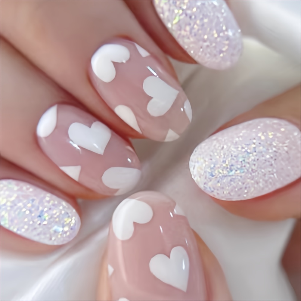 

24-piece Short Oval-shaped Pink And White Nail Tips Set With Heart Pattern, Glitter Finish, And Adhesive For Women And Girls