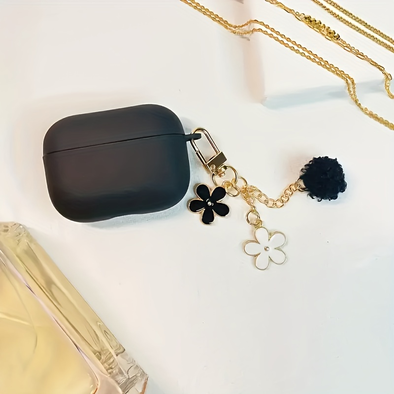 E-shop Schutzhülle für Kopfhörer in reinem Schwarz mit kleinem Blumen-Fellknäuel-Anhänger, passend für Pro der 1./2./3./4. Generation, universelle