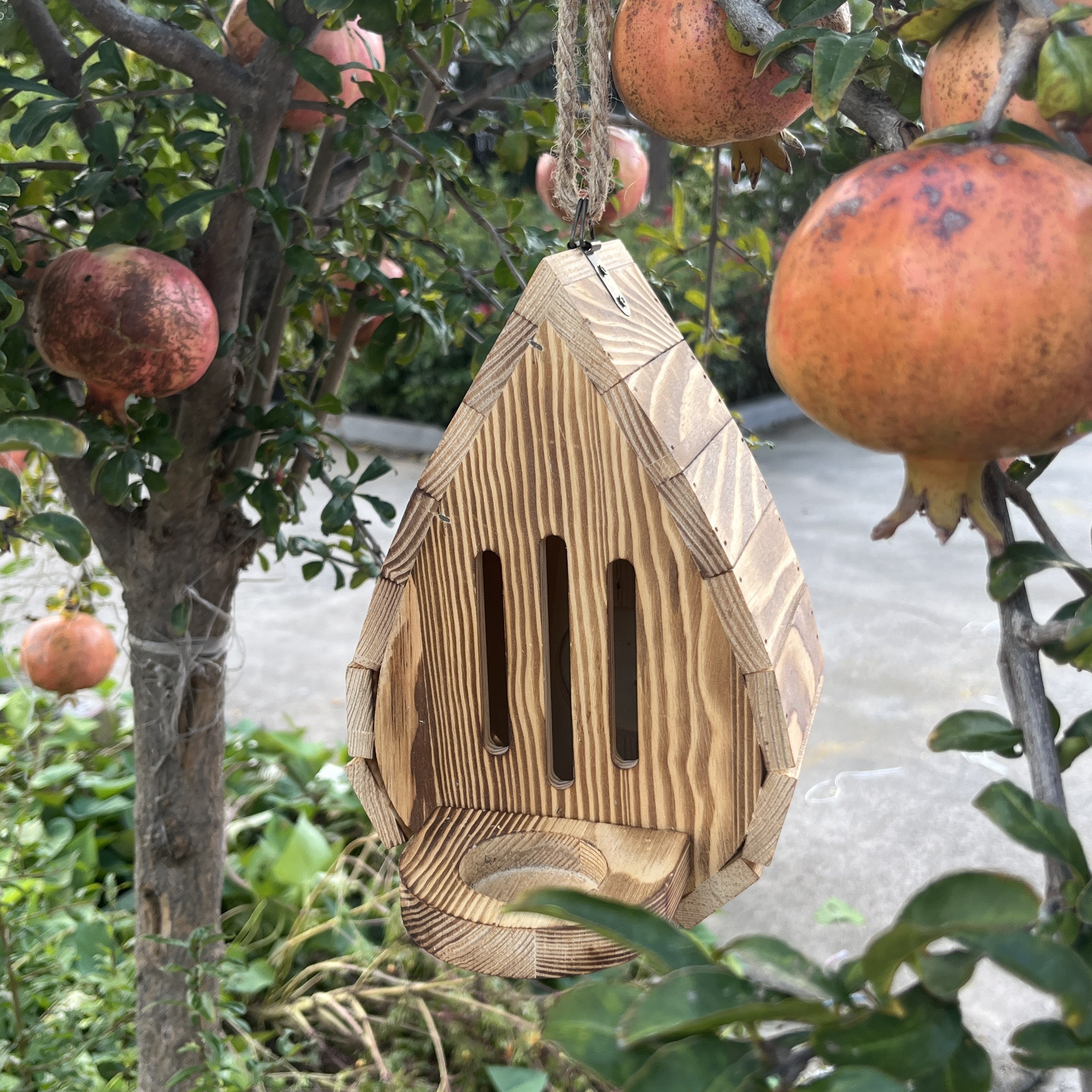 Image of A Wooden Shelter And Feeder Designed For Hanging In Gardens, Providing Habitat For Butterflies And Moths, Complete With A For Outdoor Use. Easy To And Suitable For Placement