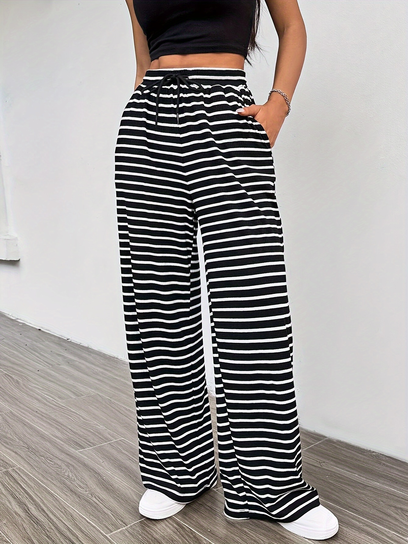 black and striped pants sold on Temu United States