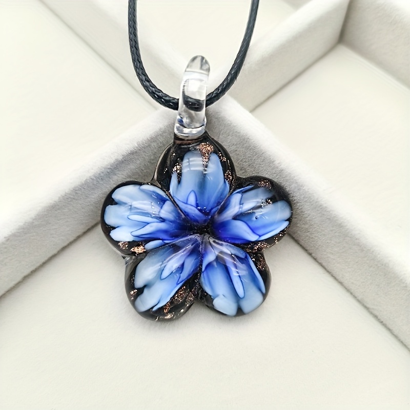 Glass Pendant Necklace on Floral Background for Daily Occasion