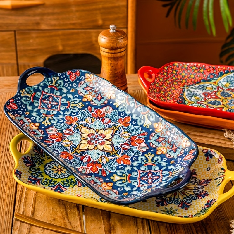 a set of four boho style ceramic fish plates, 