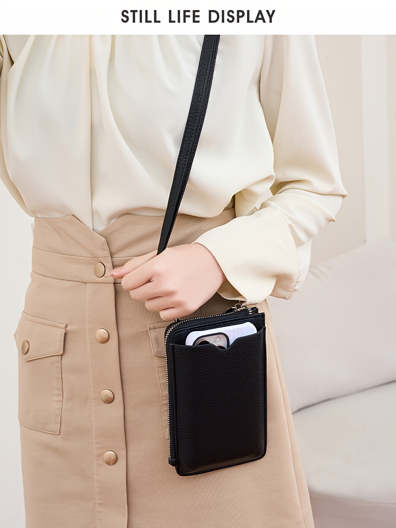 elegant black zipper wallet with adjustable strap lightweight multi compartment design for cards cash and phone ideal for everyday use everyday wallet minimalist wallet zippered closure details 5