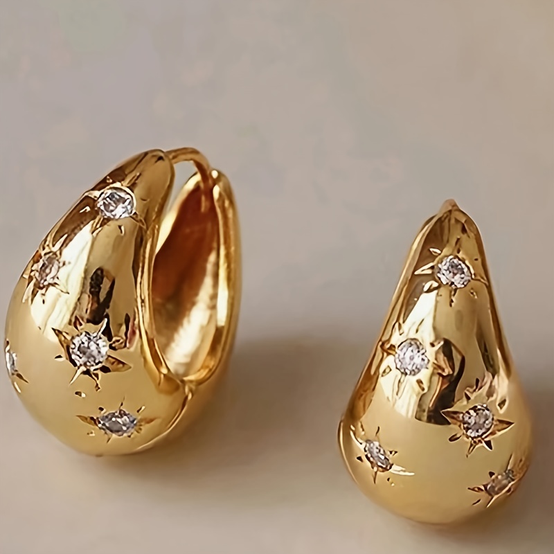 Image of A Pair Of Original Niche-design Earrings For Women, Featuring Circular And Teardrop Hoops With Vintage Metal Ear Clasps