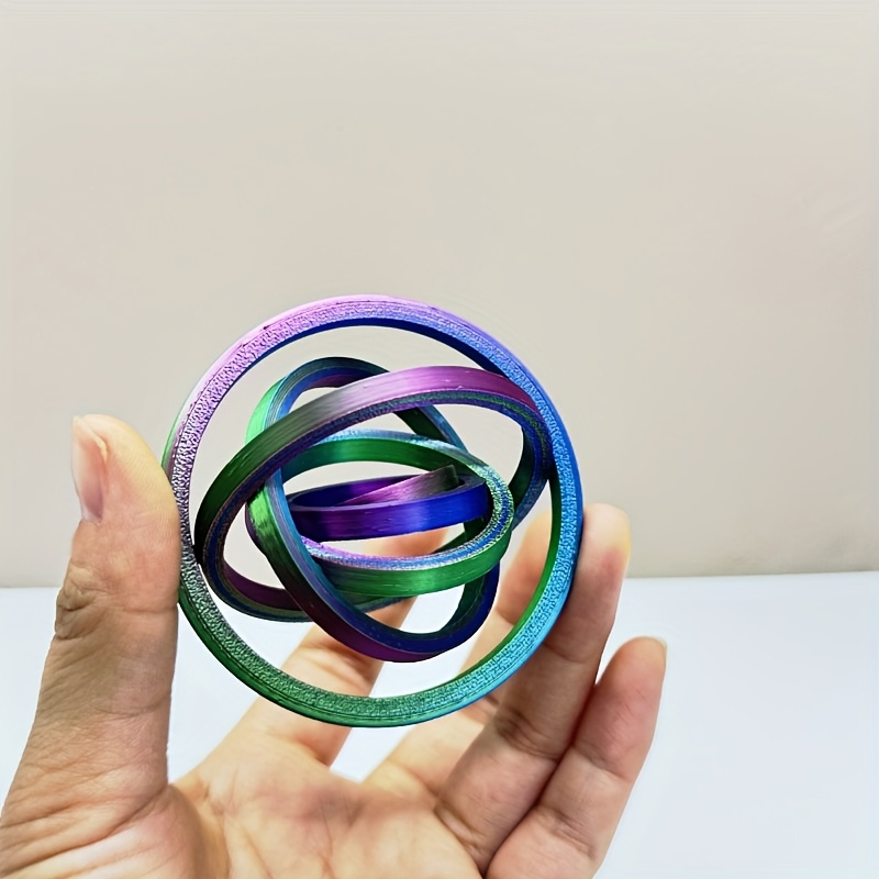 2pcs 1pc 3d printed novelty spinning fidget ring fun gift for pla material suitable for office use games mini creative toy with rotating physics gyroscopic design random color