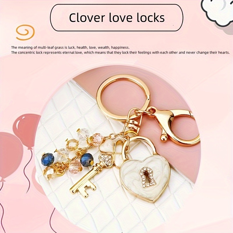 

1pc Clover Love Locks Keychain, Heart And Key Charms With Imitation Crystal Accents, Golden Metal Keyring, Creative Rhinestone Inlaid Conentric Lock, Fashion Bag Pendant, Car Accessory, Gift For Her
