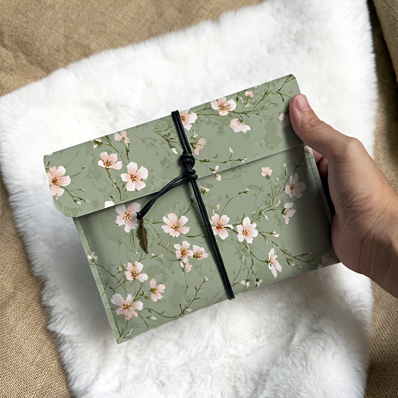 TEMU Una de almacenamiento chic y portátil para tabletas e-book con flores rosas sobre un verde, diseñada para dispositivos digitales 3C también como